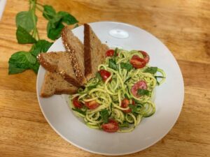 Pesto Zucchini Noodles with Garlic Bread